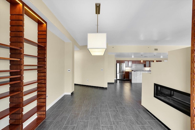 301 N Neil St Unit 808-809, Champaign, IL 61820 - hall featuring baseboards and dark wood finished floors