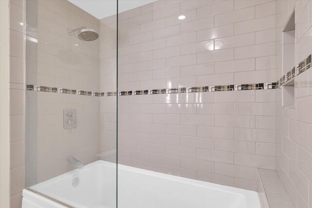 301 N Neil St Unit 808-809, Champaign, IL 61820 - bathroom with washtub / shower combination