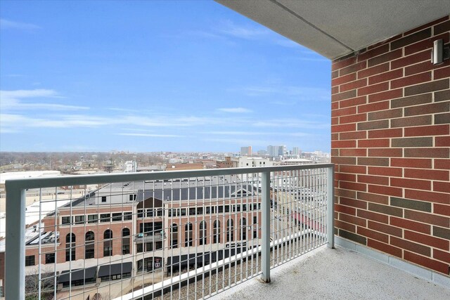 301 N Neil St Unit 808-809, Champaign, IL 61820 - balcony featuring a city view