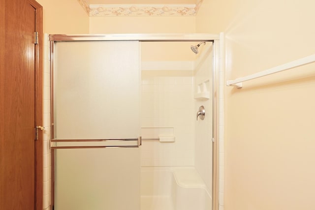 bathroom featuring an enclosed shower