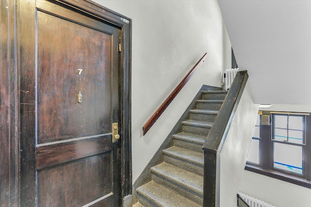 stairs featuring radiator