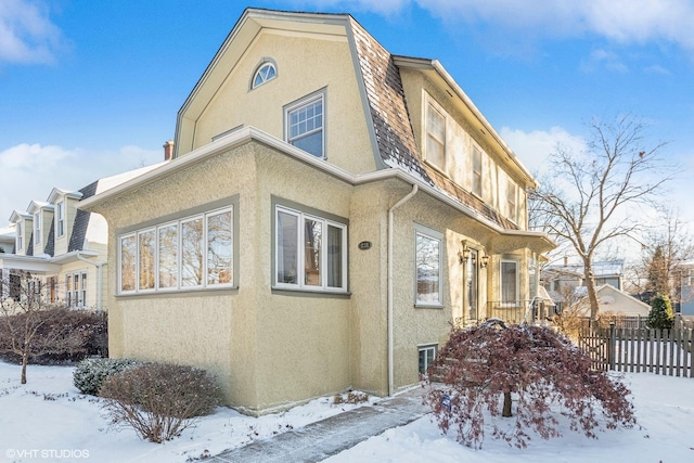 view of snow covered property