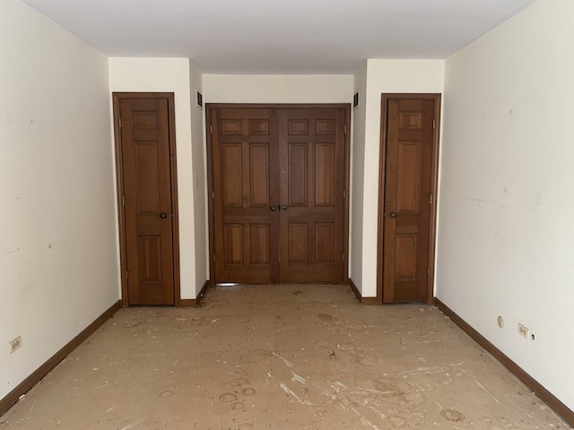 unfurnished bedroom featuring a closet