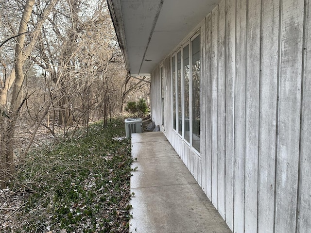 view of property exterior with central AC unit