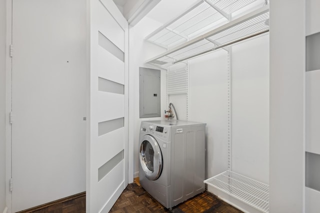 washroom with washer / clothes dryer, dark parquet floors, and electric panel