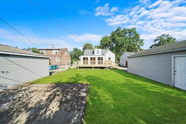 view of yard featuring a wooden deck