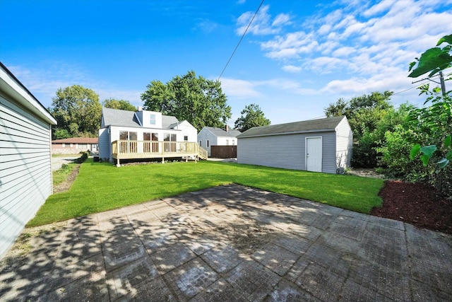 exterior space with a wooden deck and an outdoor structure