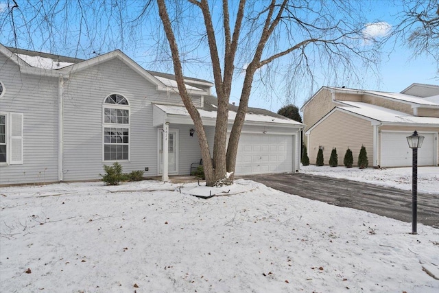 front of property featuring a garage