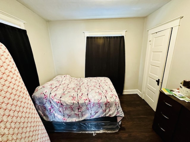 bedroom featuring dark hardwood / wood-style floors