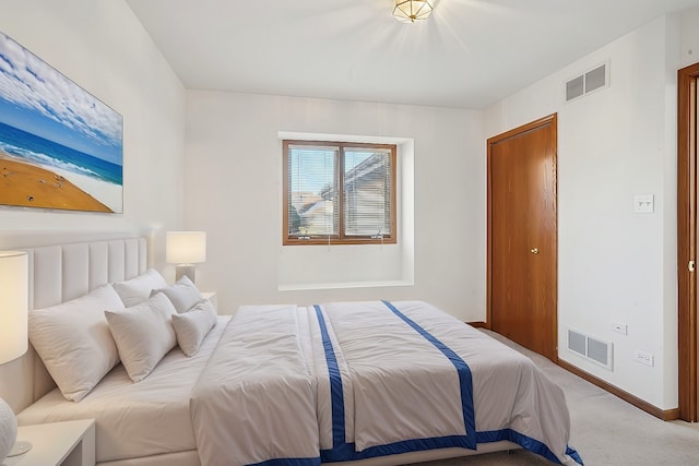 carpeted bedroom with a closet