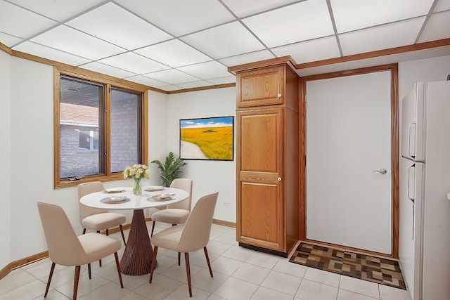 dining area with light tile patterned flooring