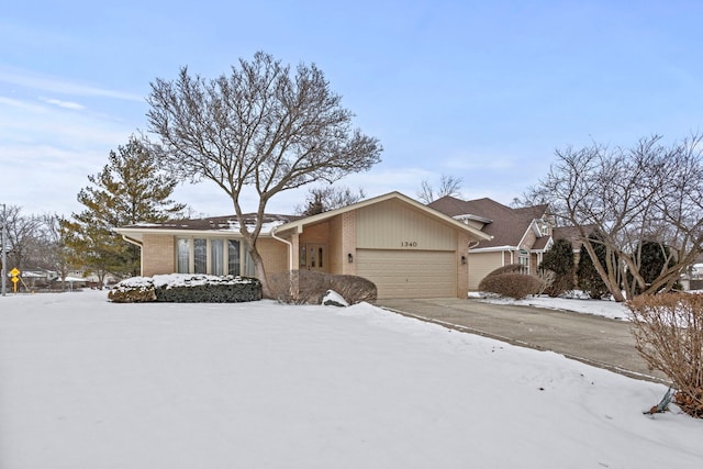 single story home featuring a garage