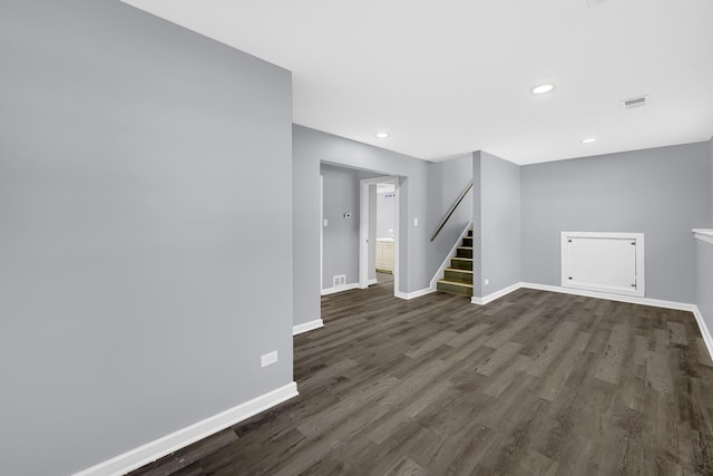 unfurnished room featuring dark hardwood / wood-style floors