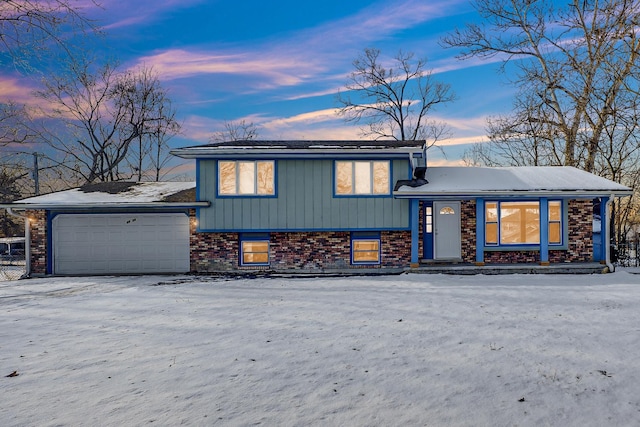 split level home with a garage