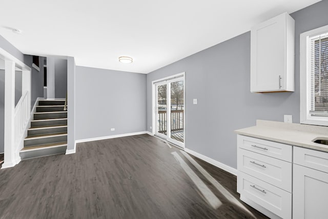 interior space with dark hardwood / wood-style flooring