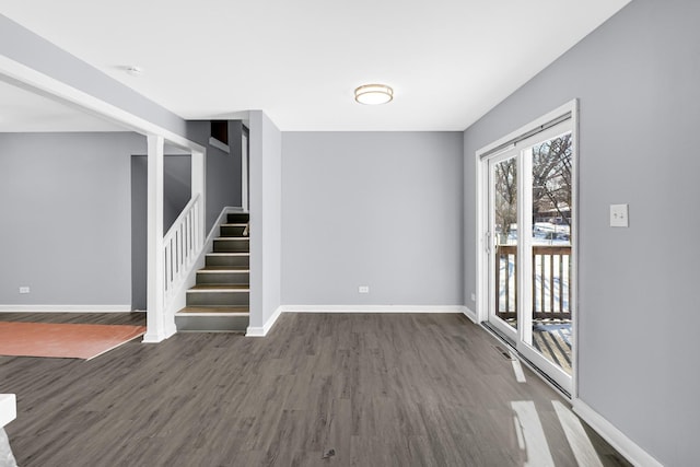 interior space with dark hardwood / wood-style floors