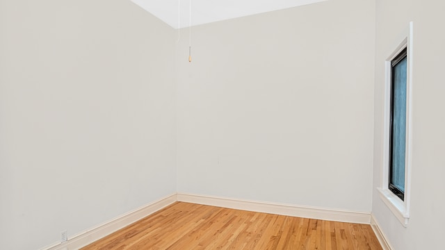 empty room featuring hardwood / wood-style floors
