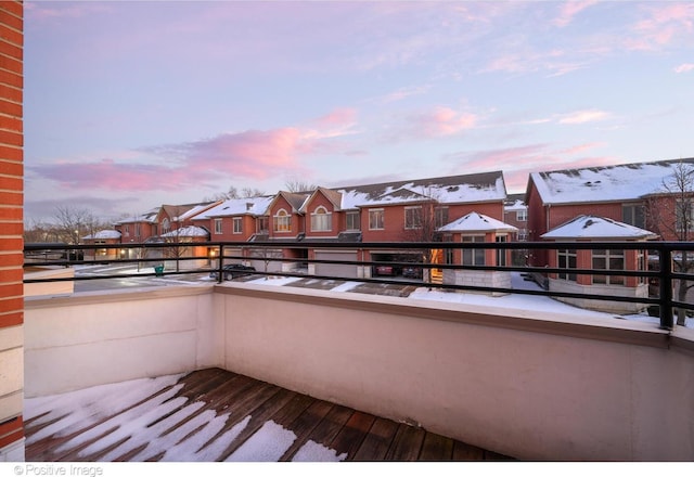 view of balcony at dusk