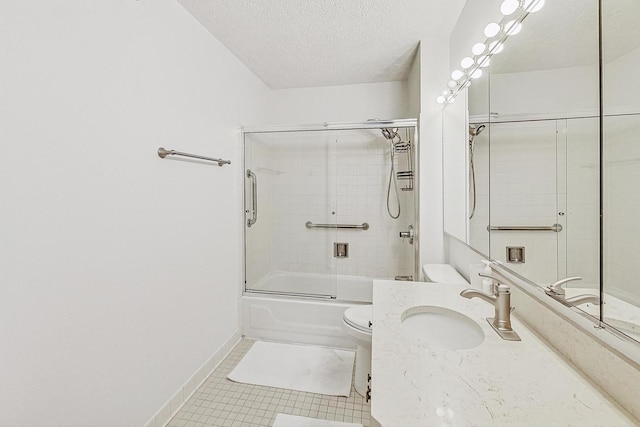 full bathroom featuring toilet, enclosed tub / shower combo, tile patterned floors, a textured ceiling, and vanity