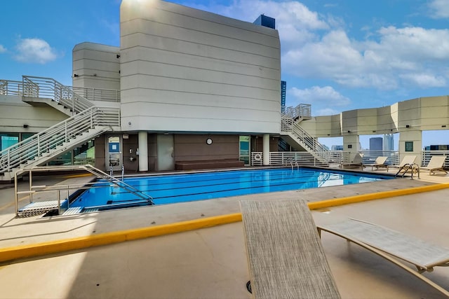 view of pool featuring a patio