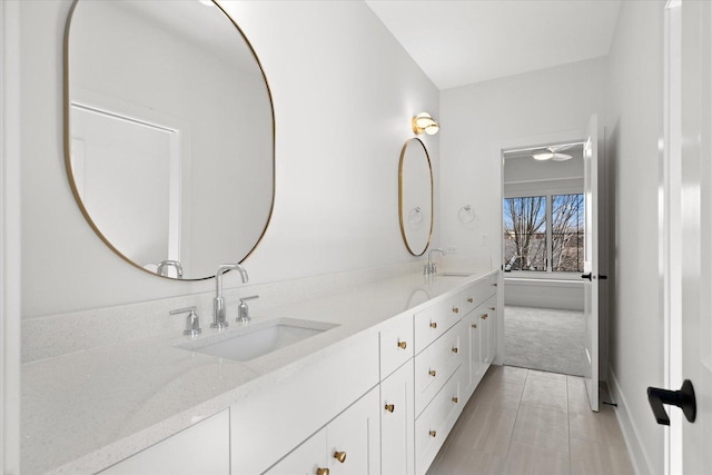 bathroom with vanity and tile patterned floors