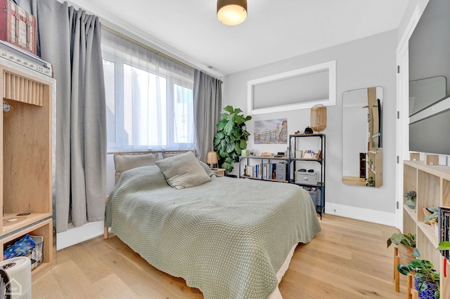 bedroom featuring light hardwood / wood-style flooring