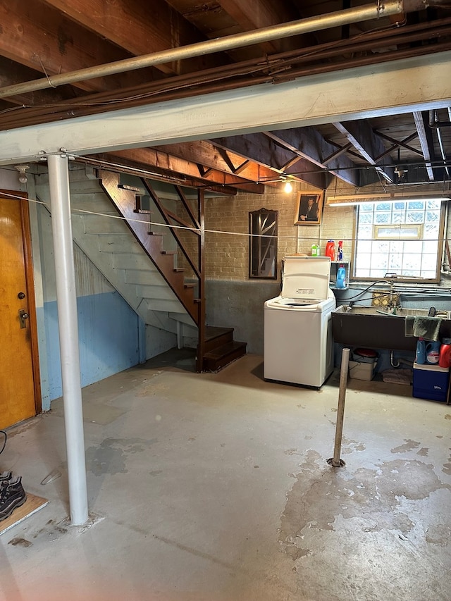 basement with washer / dryer