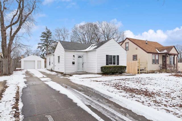 view of front of property featuring an outbuilding and a garage