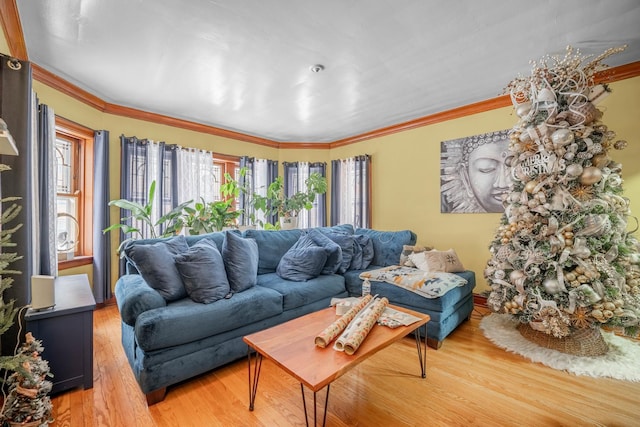 living room featuring ornamental molding and hardwood / wood-style floors