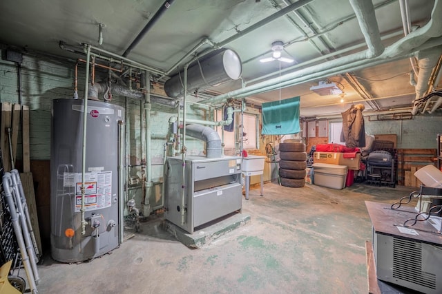 basement with sink and gas water heater