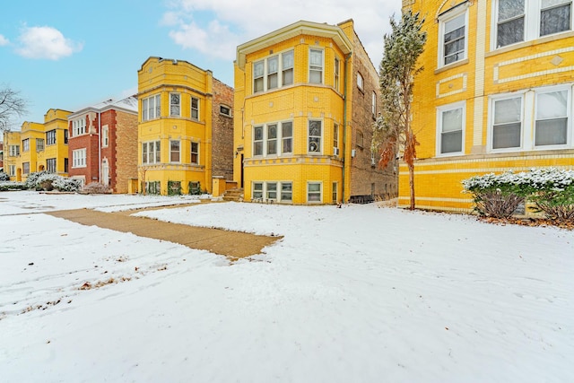 view of snow covered property