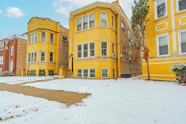 view of snow covered building