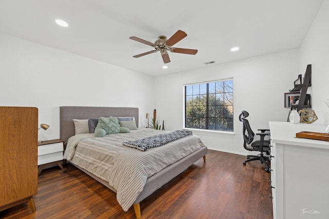 bedroom featuring ceiling fan and dark wood-type flooring