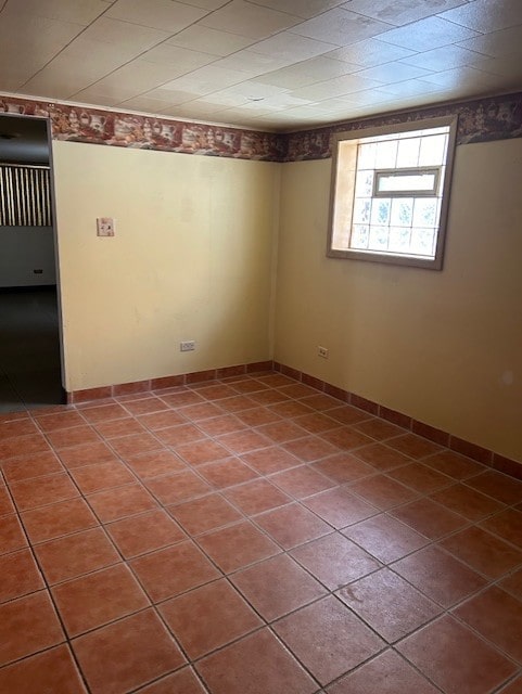 view of tiled spare room