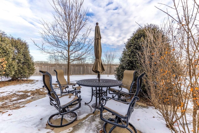 view of snow covered patio