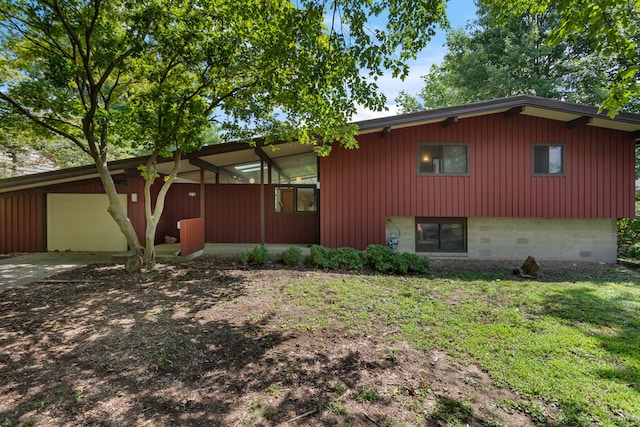 view of side of home with a garage