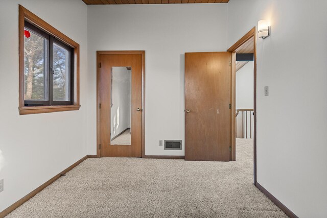 unfurnished bedroom featuring carpet flooring