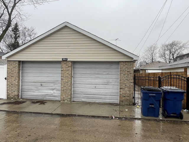 detached garage with fence