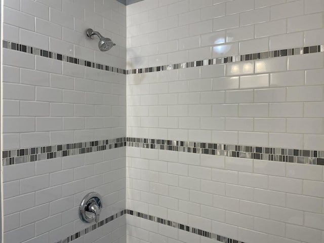 details with a tile shower