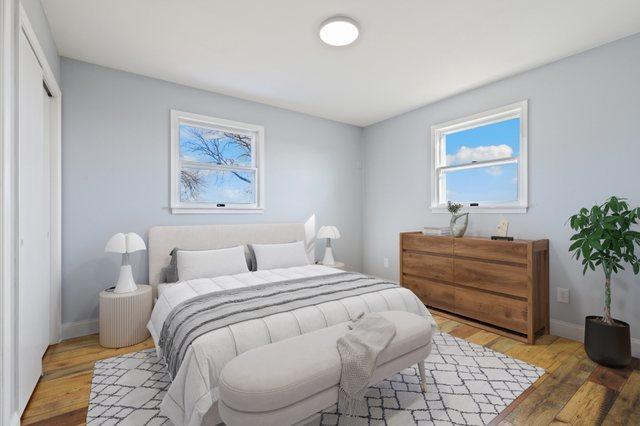 bedroom featuring wood-type flooring