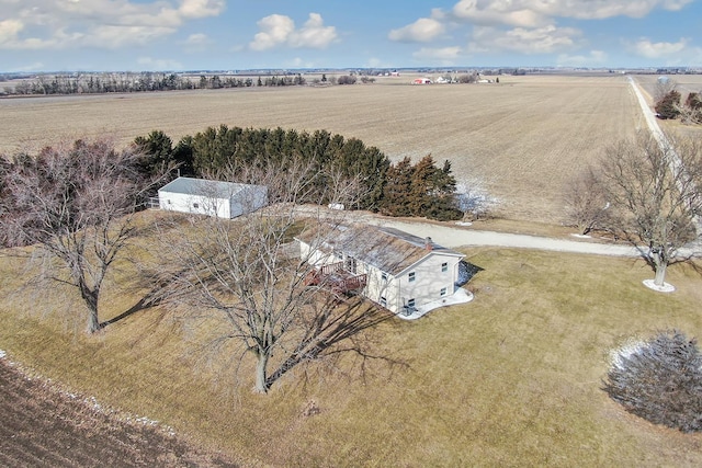 birds eye view of property with a rural view