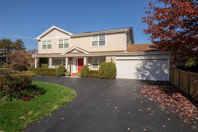 view of front of property featuring a garage