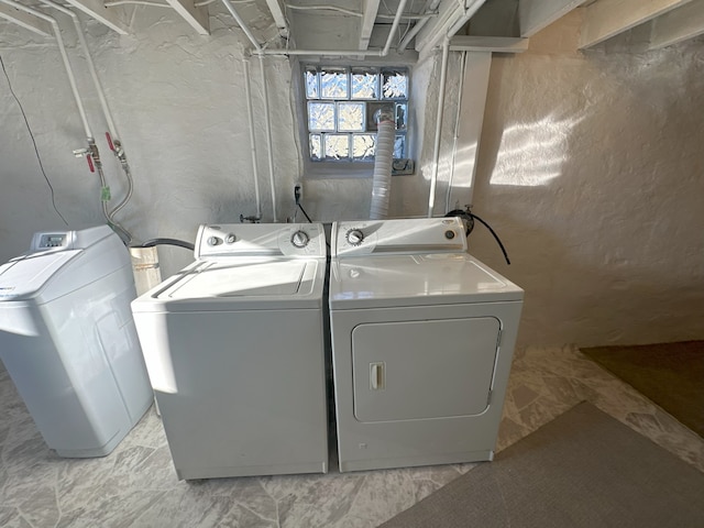 washroom with washing machine and dryer