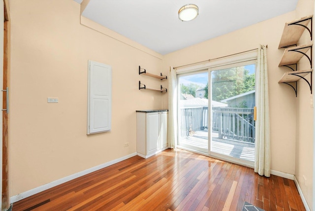 spare room featuring hardwood / wood-style flooring