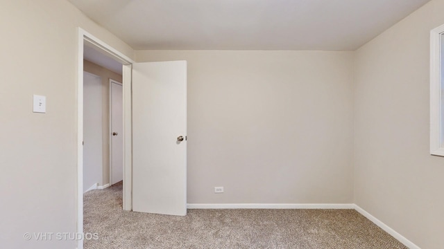 unfurnished bedroom with light colored carpet