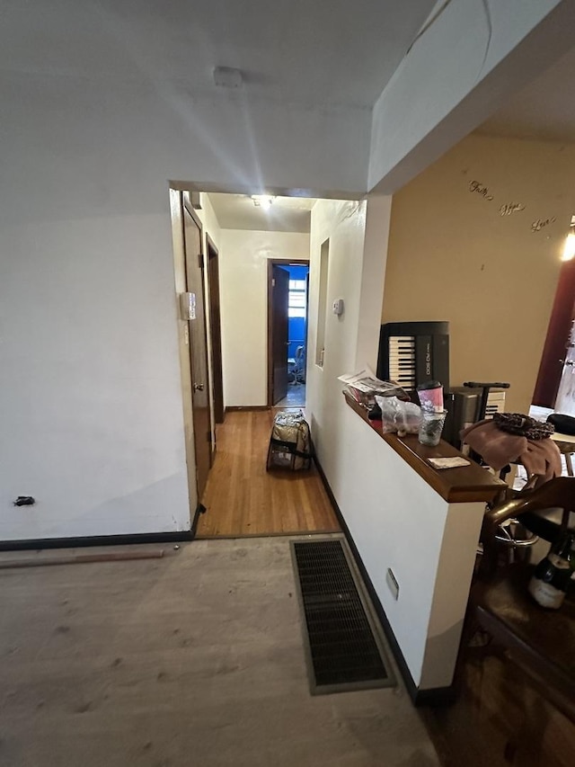 hall featuring light hardwood / wood-style floors