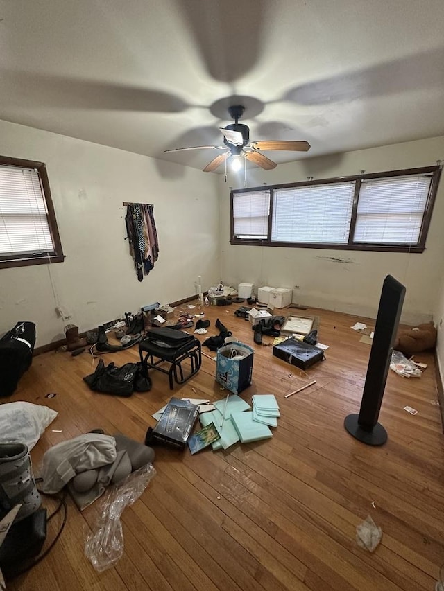 miscellaneous room featuring ceiling fan and hardwood / wood-style floors