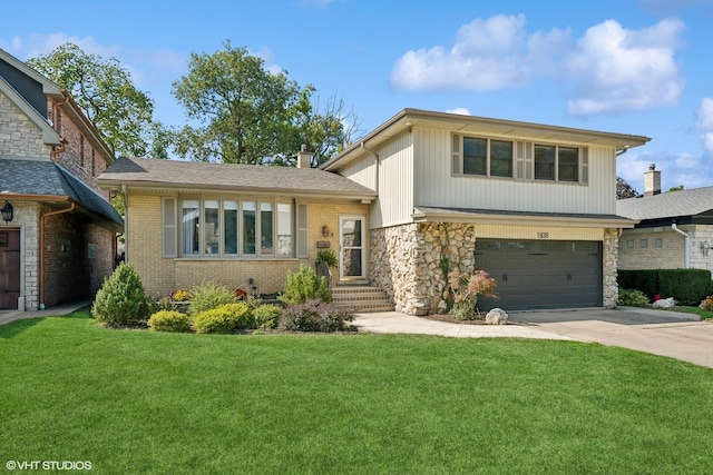 split level home featuring a front lawn and a garage