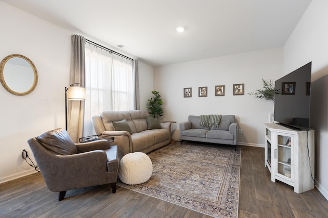 living room with dark wood-type flooring