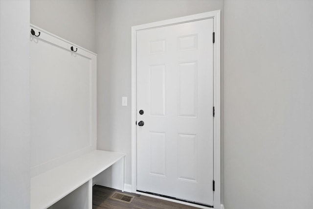 mudroom with dark wood-type flooring